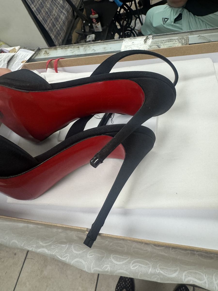 Black heels with red soles at Alfredo Shoe Repair
